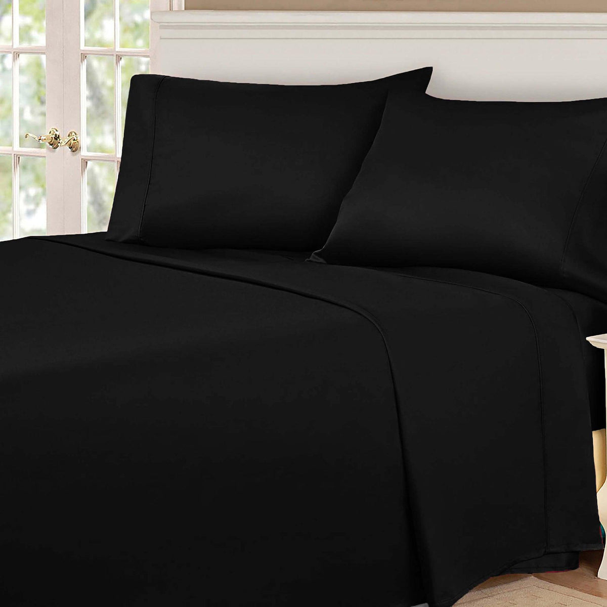 Black 530 Thread Count Egyptian Cotton Sateen Bed Sheet Set displayed on a modern bed