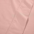 Blush pink 1000 Thread Count Cotton Blend Sheets Set solid deep pocket hemline and stitching close-up fabric texture
