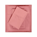 Blush pink 600 thread count cotton blend solid bed sheet set pieces folded in a neat stack