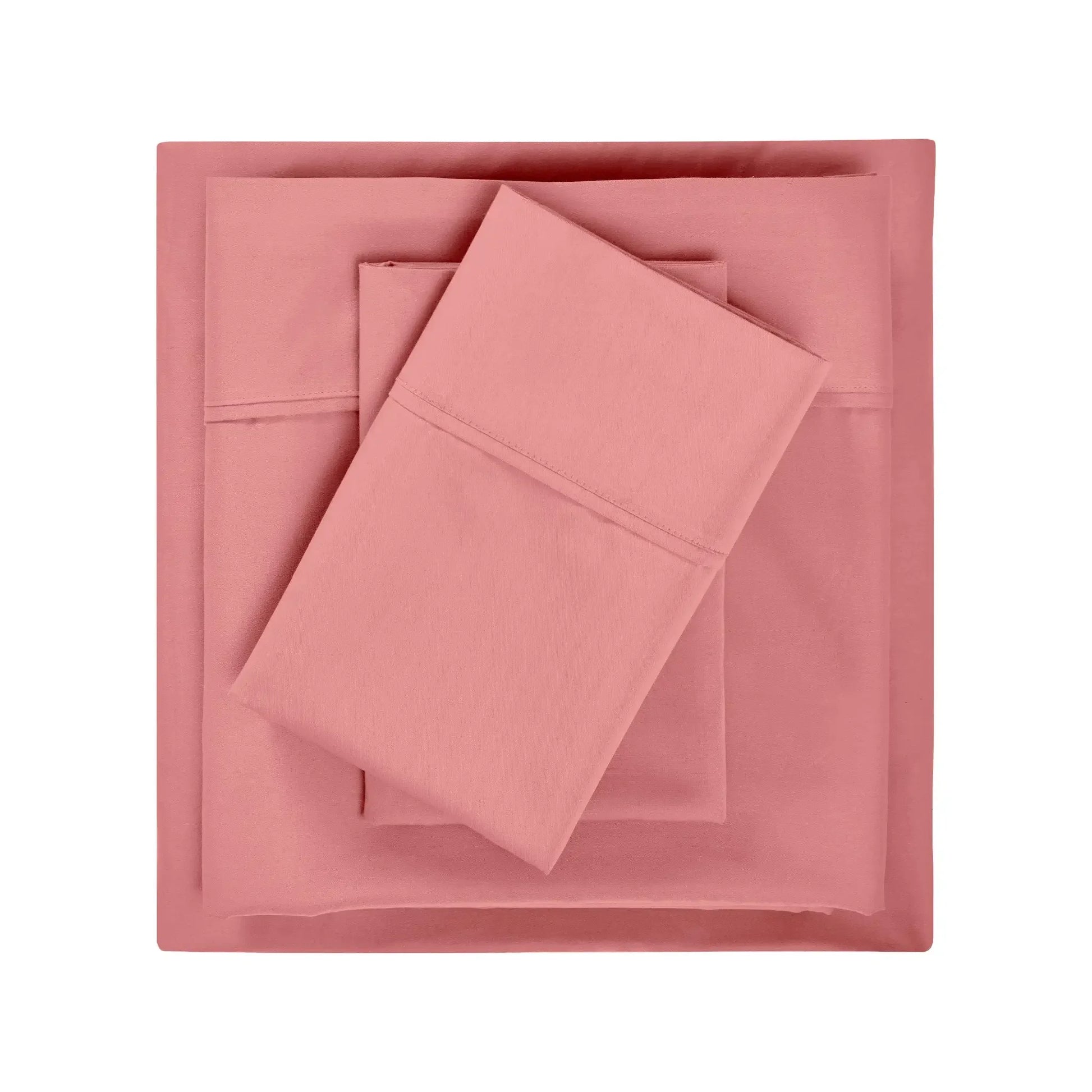 Blush pink 600 thread count cotton blend solid bed sheet set pieces folded in a neat stack