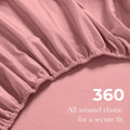Blush pink Egyptian Cotton fitted sheet showing 360-degree all-around elastic feature