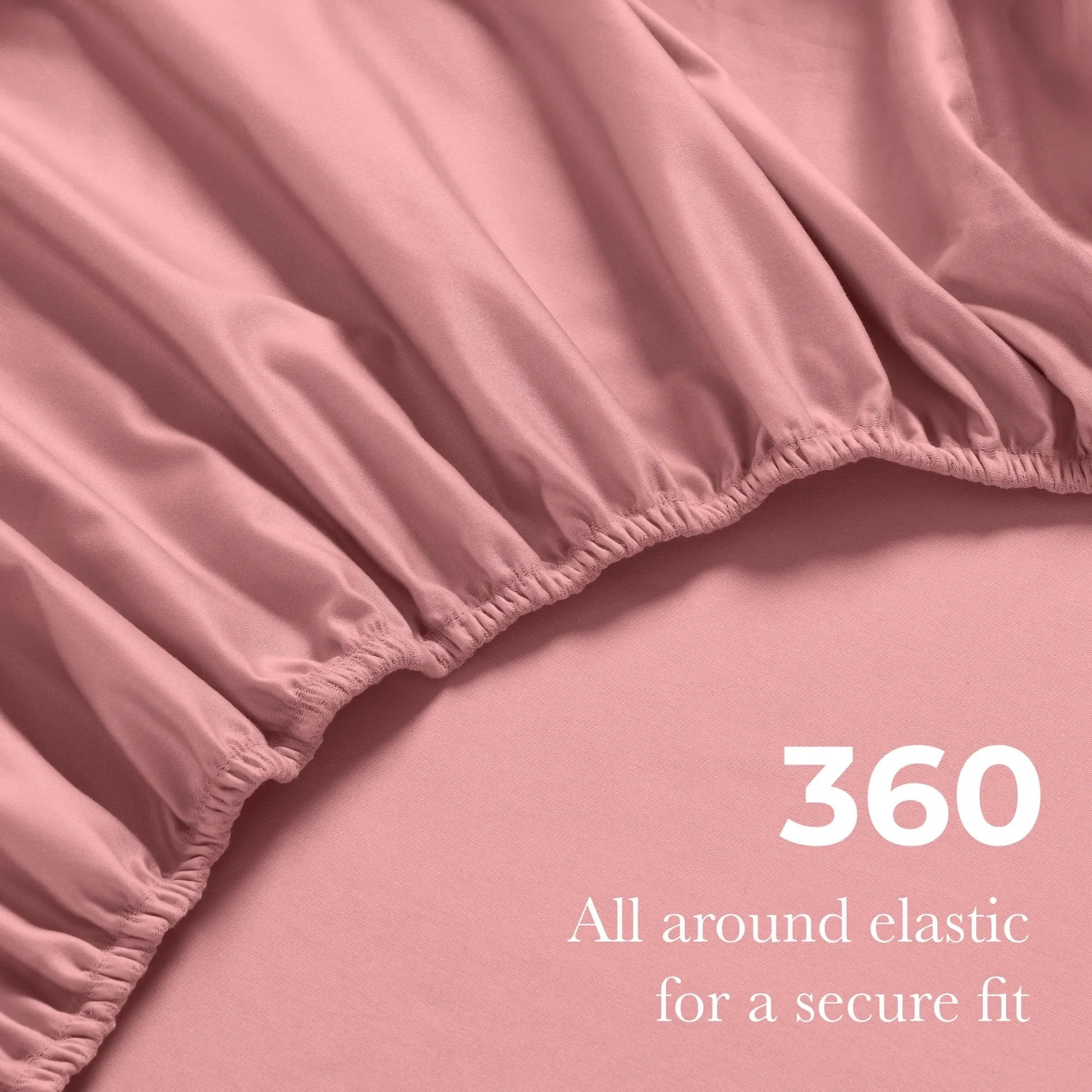 Blush pink Egyptian Cotton fitted sheet showing 360-degree all-around elastic feature