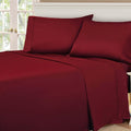Burgundy 530 Thread Count Egyptian Cotton Sateen Bed Sheet Set displayed on a modern bed
