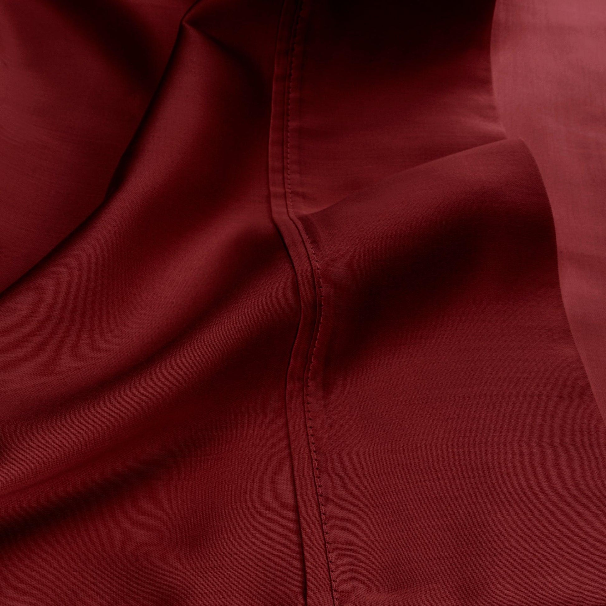 Burgundy 530 Thread Count Egyptian Cotton Sateen sheet hem and stitching detail close-up