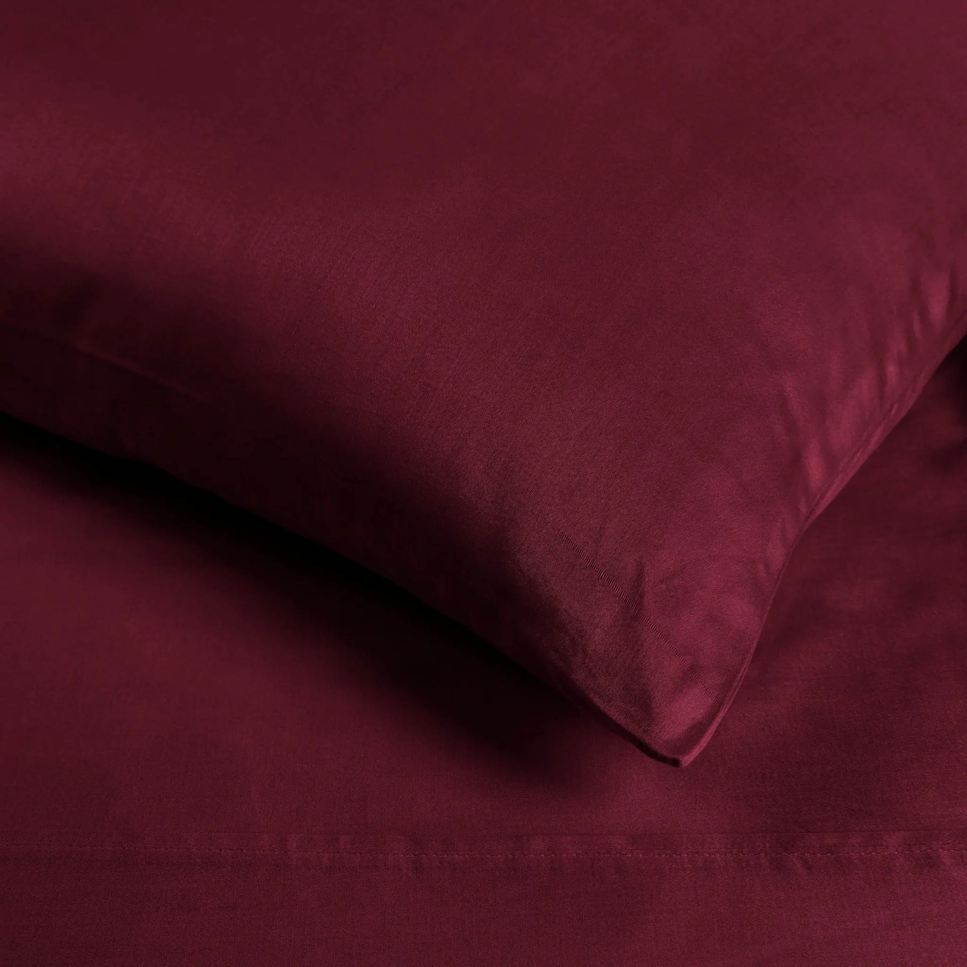 Burgundy 700 Thread Count Egyptian Cotton Sateen sheet fabric texture close-up