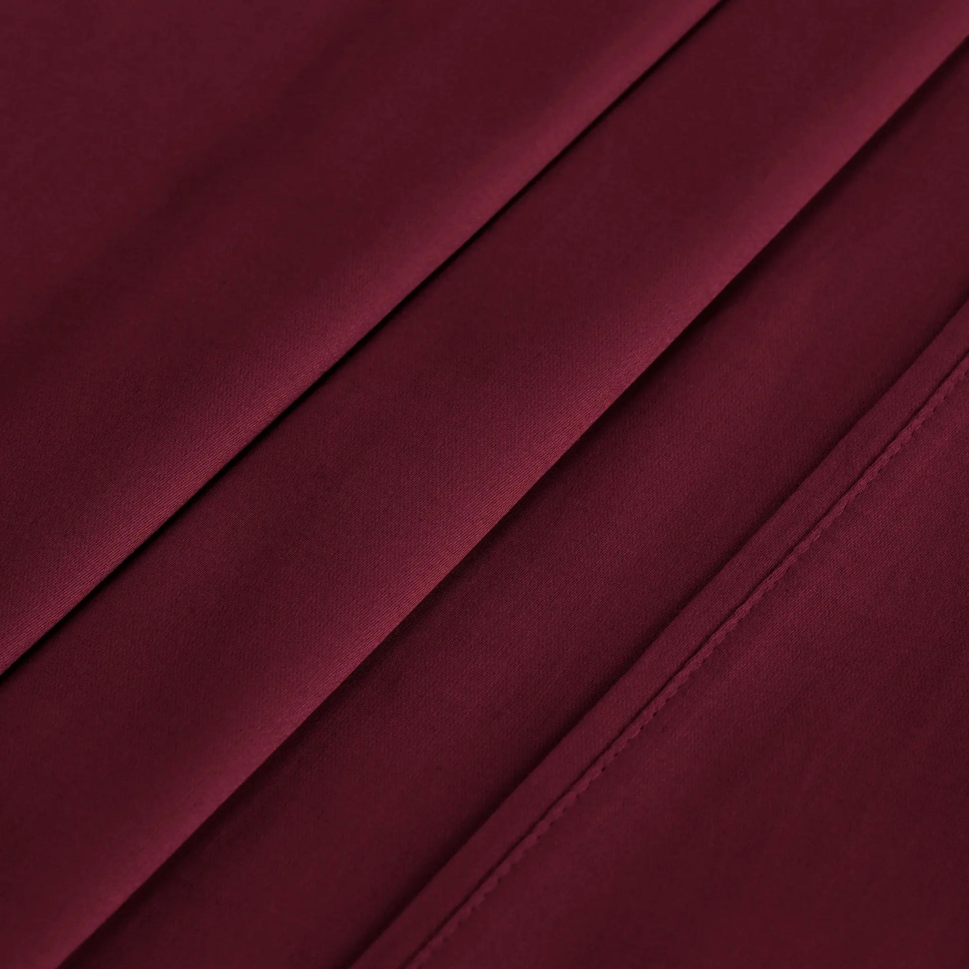 Burgundy 700 Thread Count Egyptian Cotton Sateen sheet hem and stitching detail close-up