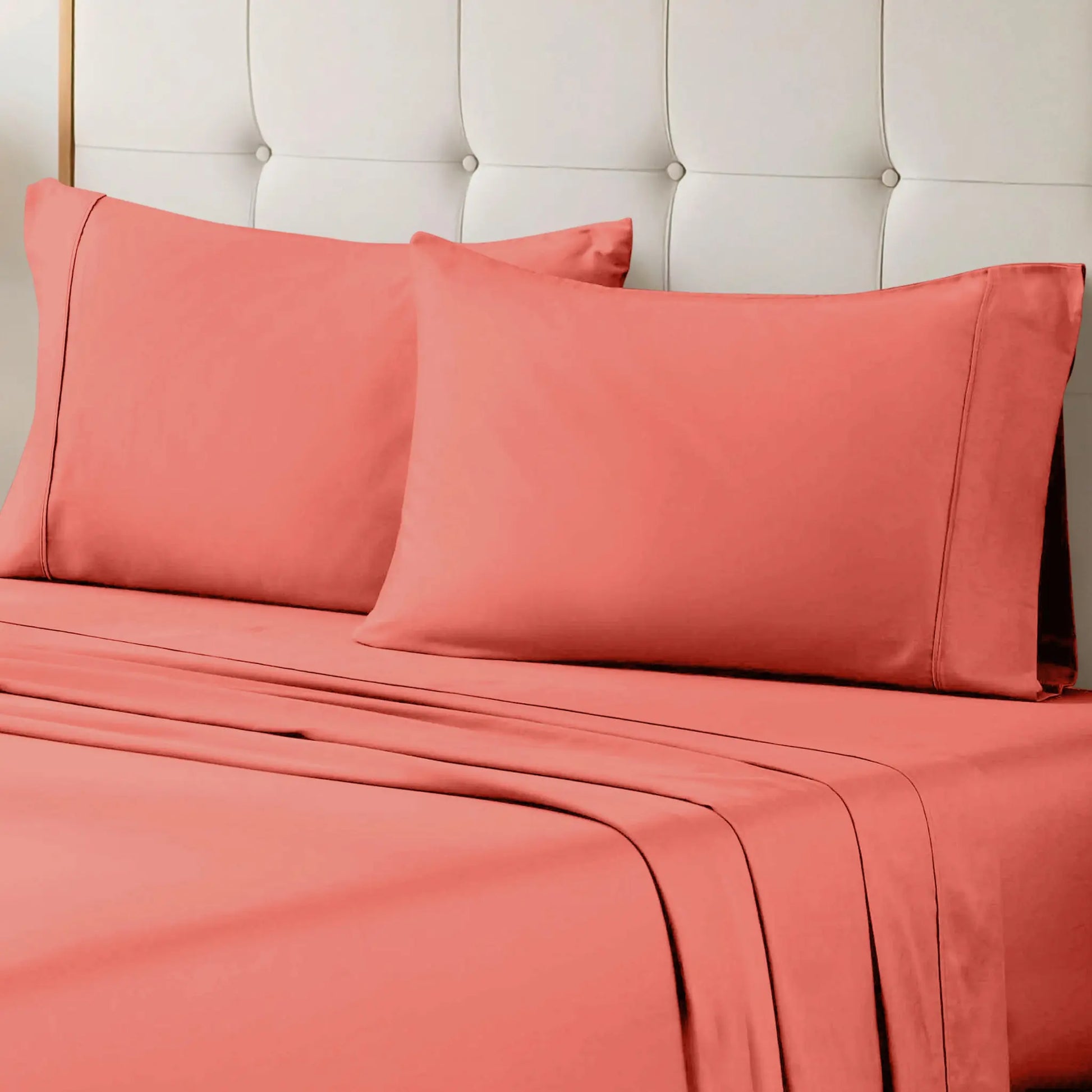 Coral 700 Thread Count Egyptian Cotton Sateen Bed Sheet Set displayed on a modern bed