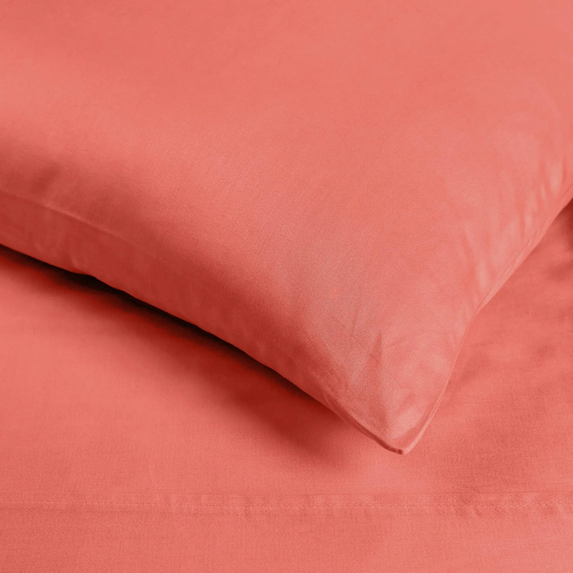 Coral 700 Thread Count Egyptian Cotton Sateen sheet fabric texture close-up