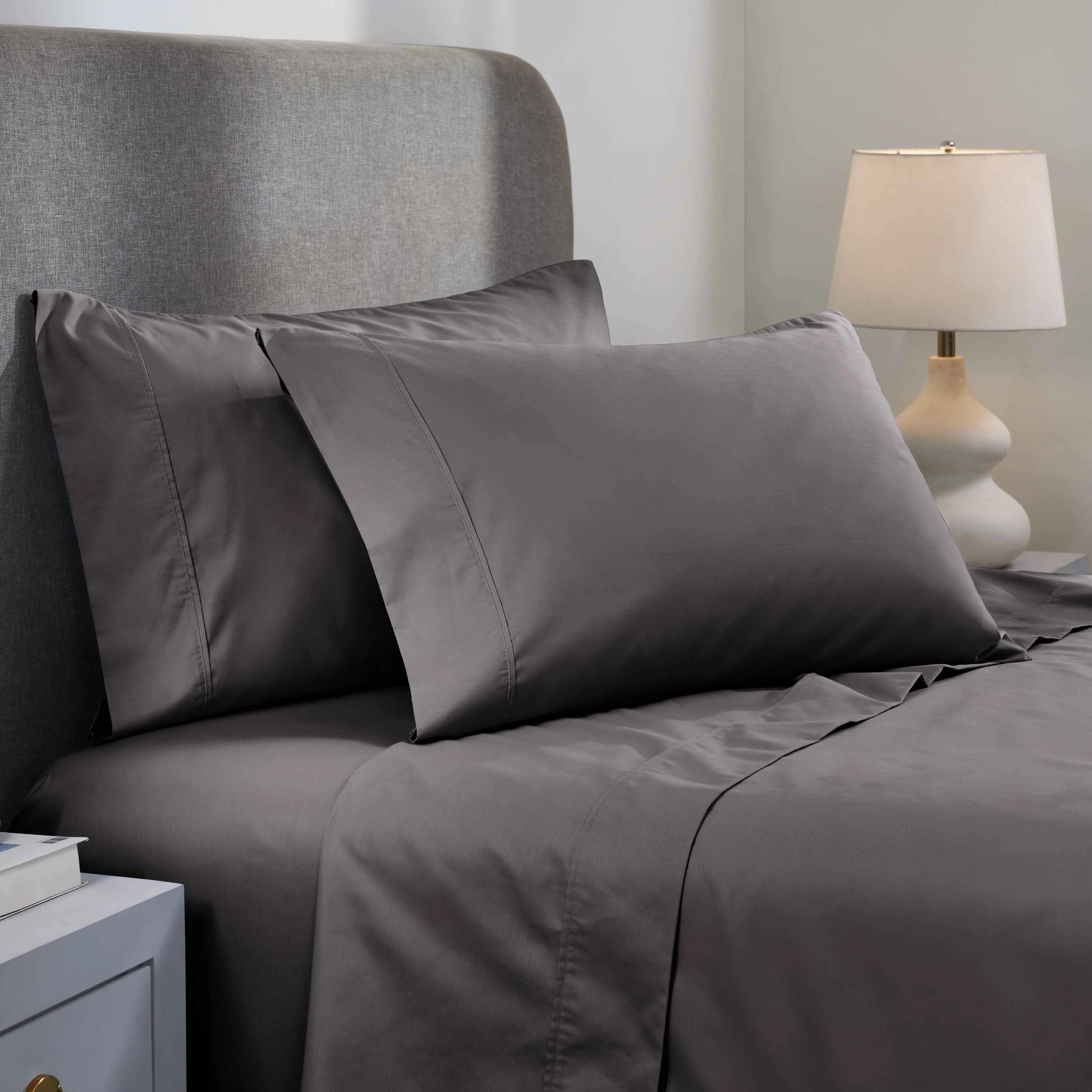 Dark gray 1000 Thread Count Cotton Blend Sheets Set solid deep pocket lifestyle display on a modern staged bed