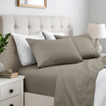 Dark grey 600 thread count cotton blend bed sheet set on a neatly made bed