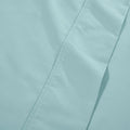 Detailed fabric close-up of light blue 600 thread count cotton blend solid deep pocket bed sheet