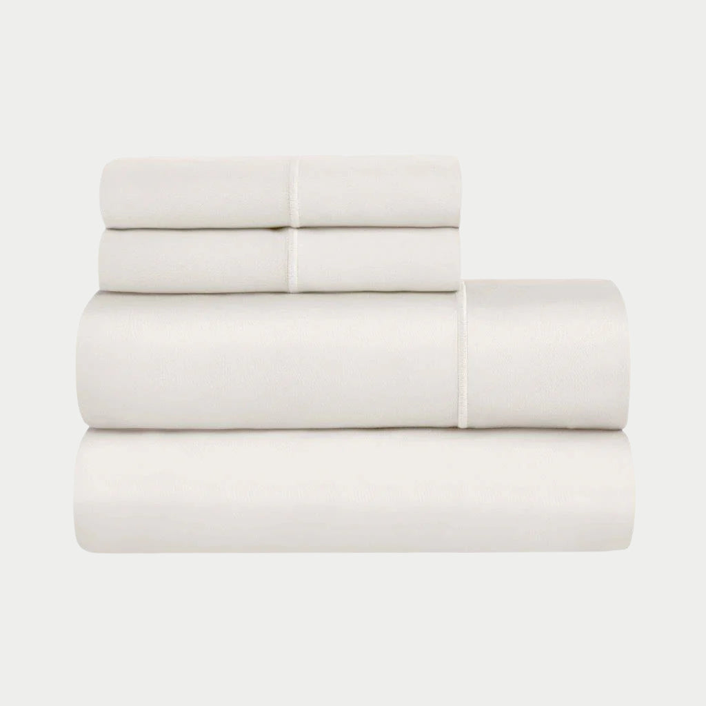 Folded Ivory 1500 Thread Count Egyptian Cotton Sheets Set product package stack.