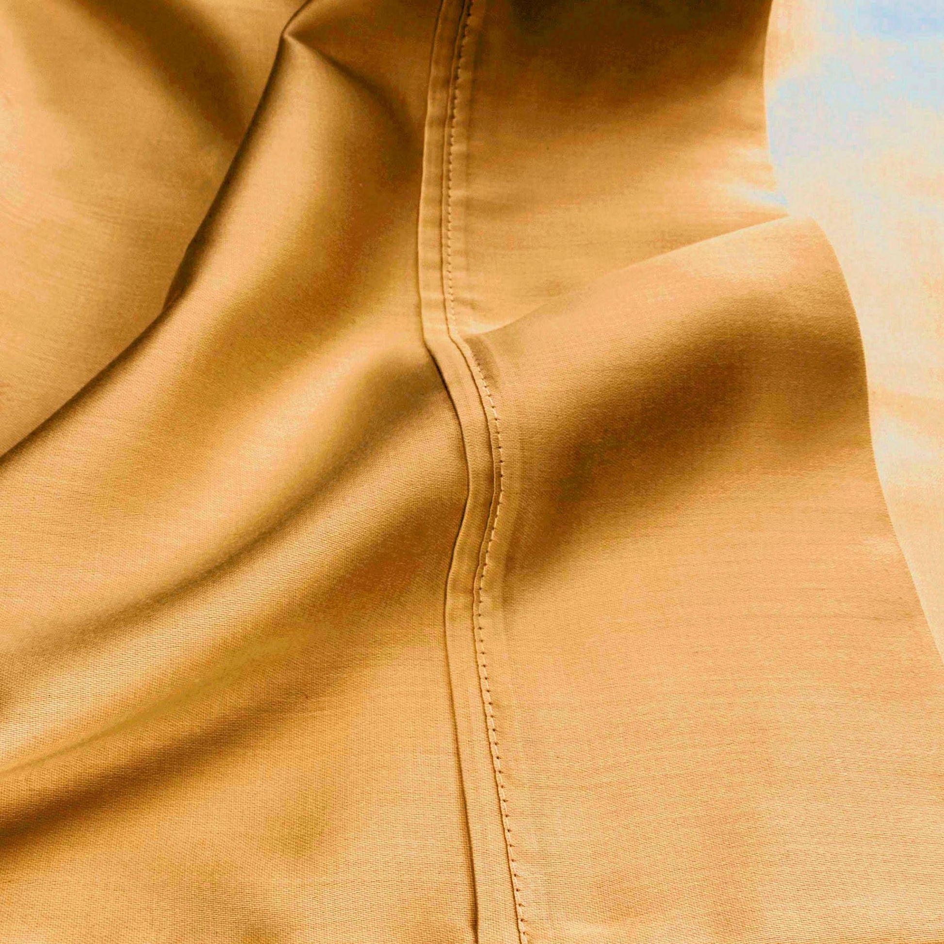 Gold Yellow 530 Thread Count Egyptian Cotton Sateen sheet hem and stitching detail close-up