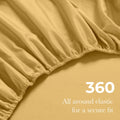 Gold yellow Egyptian Cotton fitted sheet showing 360-degree all-around elastic feature