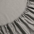 Gray 1500 Thread Count Egyptian Cotton Fitted Sheet corner elastic band close-up texture.
