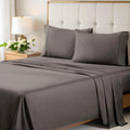 Gray 700 Thread Count Egyptian Cotton Sateen Bed Sheet Set displayed on a modern bed