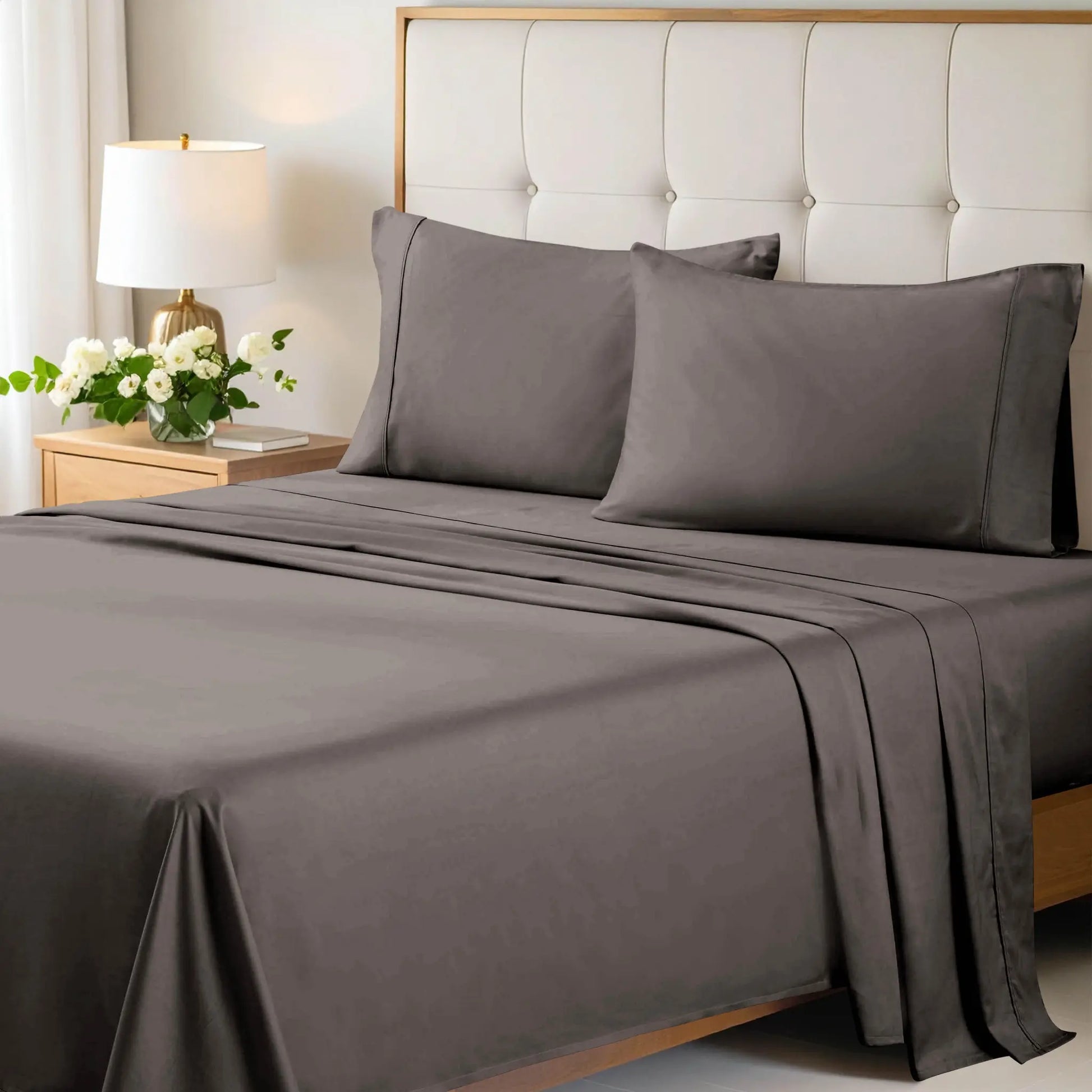 Gray 700 Thread Count Egyptian Cotton Sateen Bed Sheet Set displayed on a modern bed