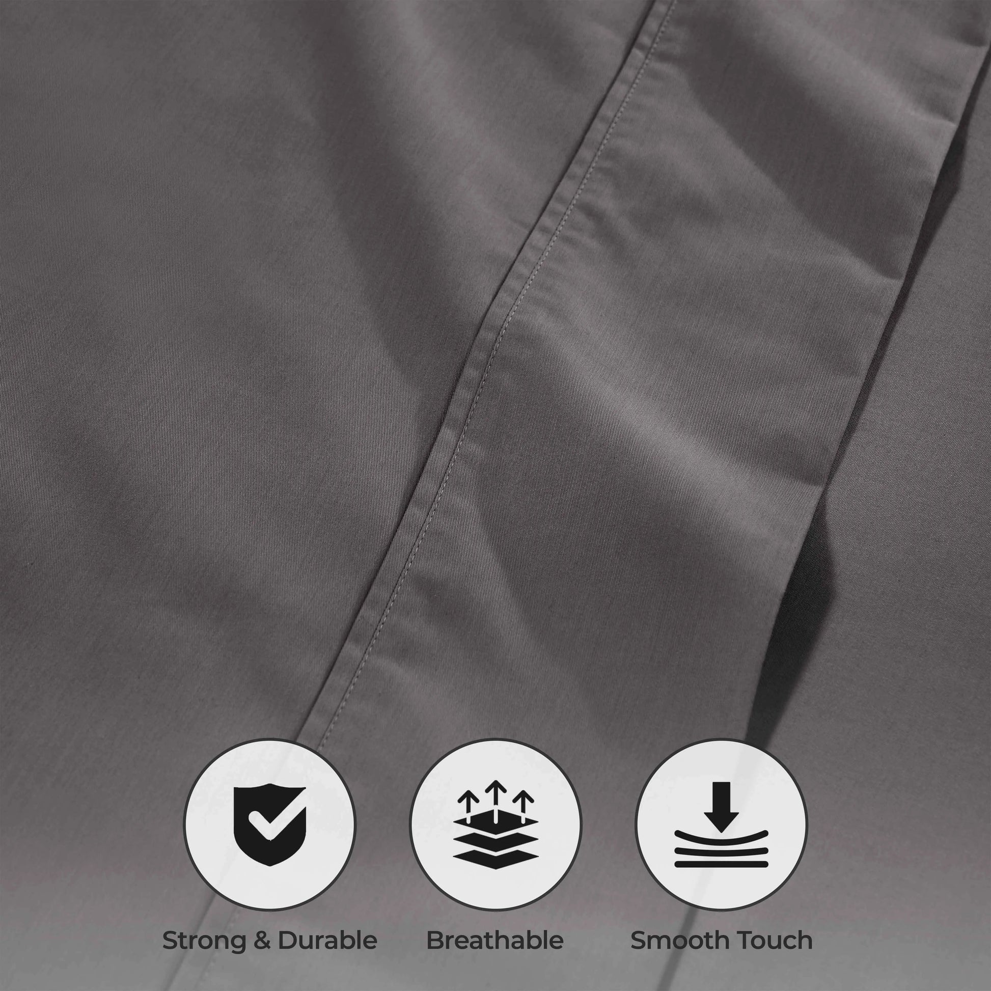 Gray fabric with icons and text indicating strength, breathability, and smooth touch on a gray background.