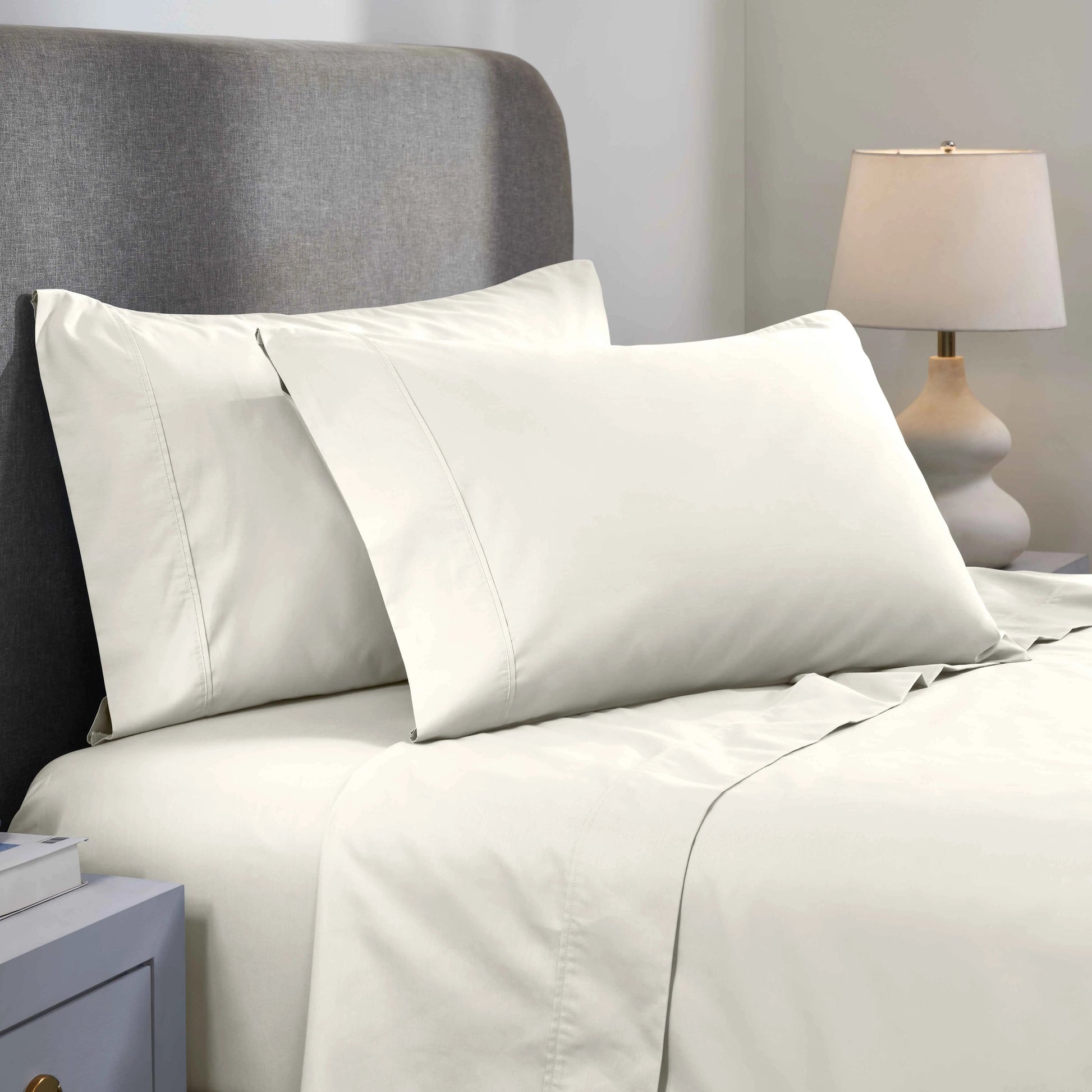 Ivory 1000 Thread Count Cotton Blend Sheets Set solid deep pocket lifestyle display on a modern staged bed