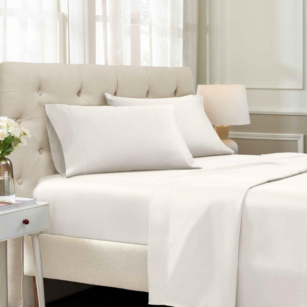 Ivory 1500 Thread Count Egyptian Cotton Sheets Set deep pocket hotel quality lifestyle display on a modern staged bed.