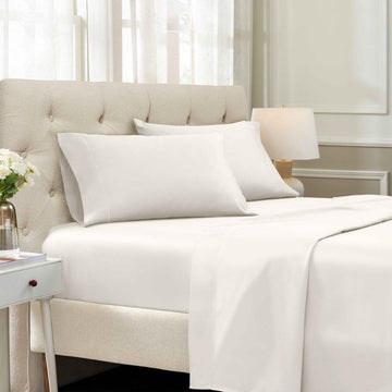 Ivory 1500 Thread Count Egyptian Cotton Sheets Set deep pocket hotel quality lifestyle display on a modern staged bed.