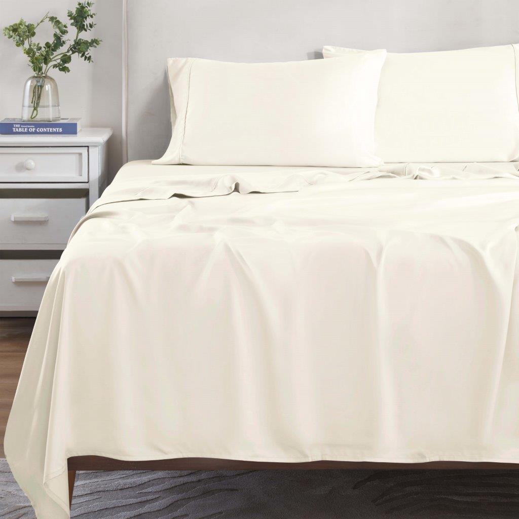 Ivory 300 Thread Count Modal Sheets Set made from beechwood displayed on a staged bed