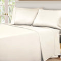 Ivory 530 Thread Count Egyptian Cotton Sateen Bed Sheet Set displayed on a modern bed