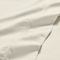 Ivory 600 Thread Count Cotton Blend Bed Sheet Set Imperia embroidery detail close-up texture.