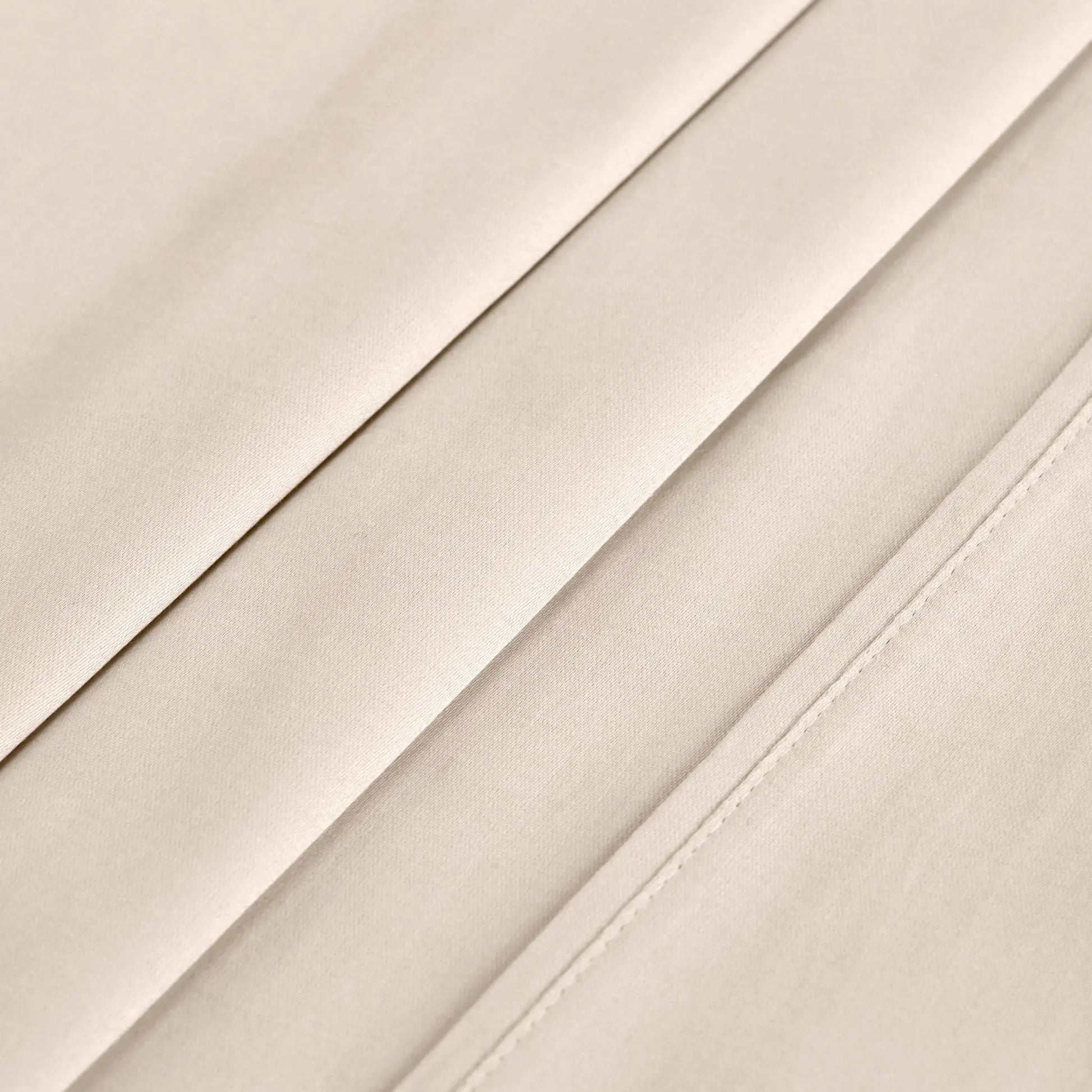 Ivory 700 Thread Count Egyptian Cotton Sateen sheet hem and stitching detail close-up