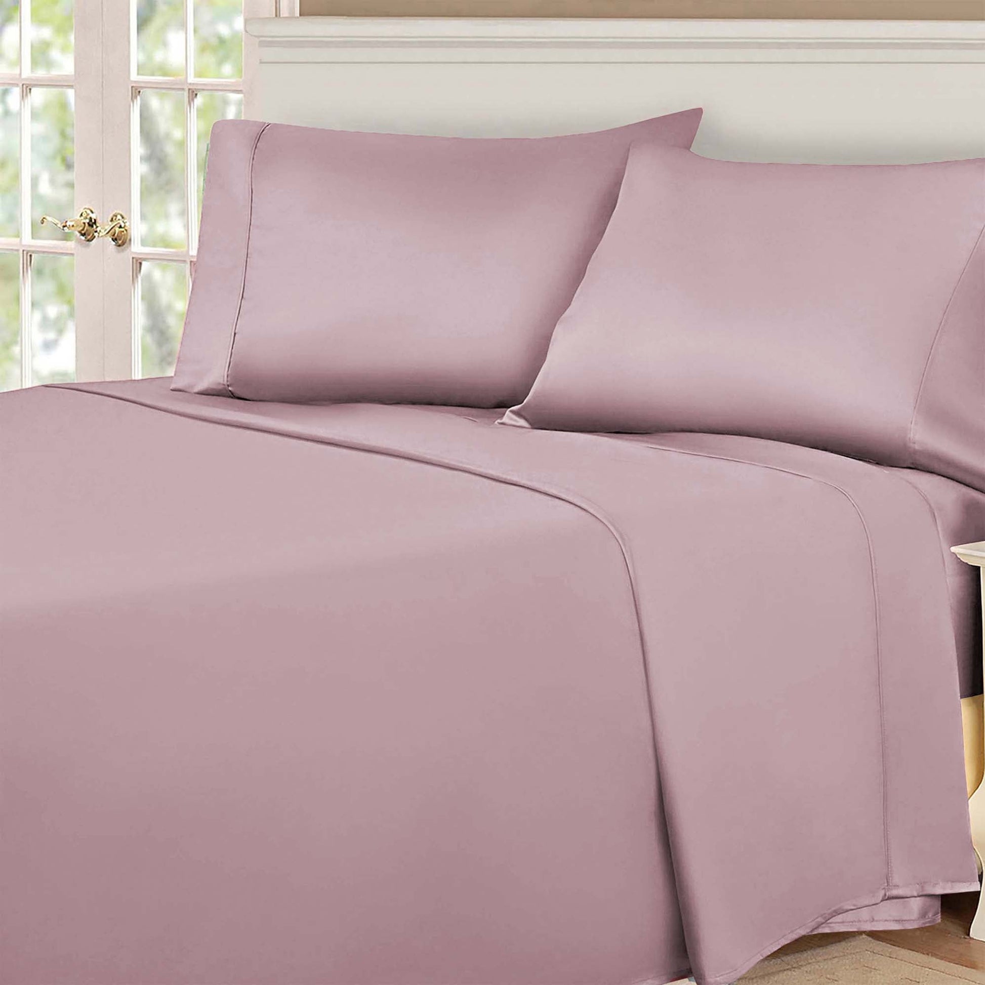 Lavender 530 Thread Count Egyptian Cotton Sateen Bed Sheet Set displayed on a modern bed