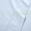 Light blue 1000 Thread Count Cotton Blend Sheets Set solid deep pocket hemline and stitching close-up fabric texture