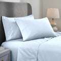 Light blue 1000 Thread Count Cotton Blend Sheets Set solid deep pocket lifestyle display on a modern staged bed