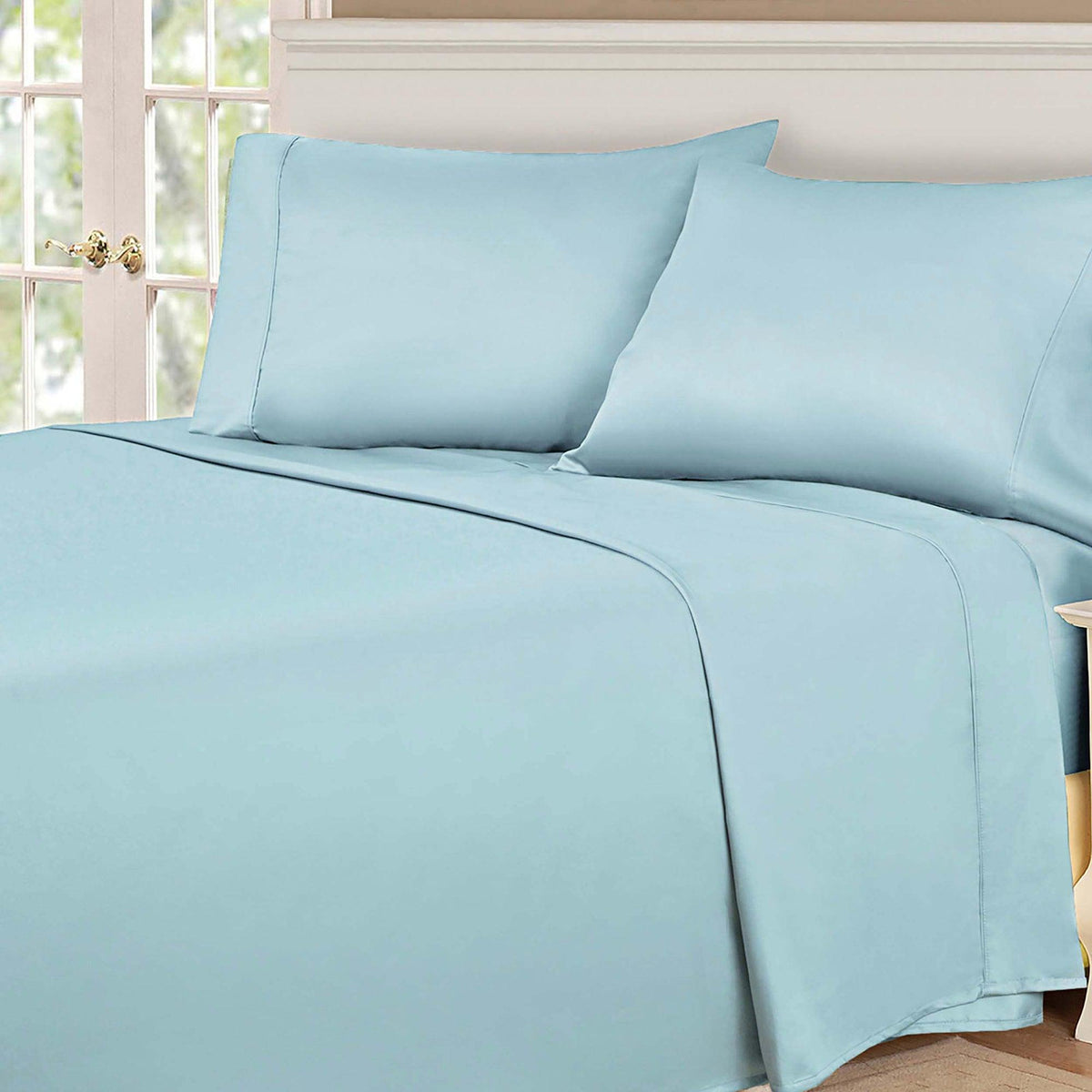 Light blue 530 Thread Count Egyptian Cotton Sateen Bed Sheet Set displayed on a modern bed