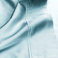 Light blue 530 Thread Count Egyptian Cotton Sateen sheet hem and stitching detail close-up