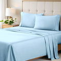 Light blue 700 Thread Count Egyptian Cotton Sateen Bed Sheet Set displayed on a modern bed