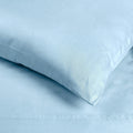 Light blue 700 Thread Count Egyptian Cotton Sateen sheet fabric texture close-up