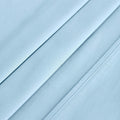 Light blue 700 Thread Count Egyptian Cotton Sateen sheet hem and stitching detail close-up