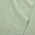 Light green 1000 Thread Count Cotton Blend Sheets Set solid deep pocket hemline and stitching close-up fabric texture