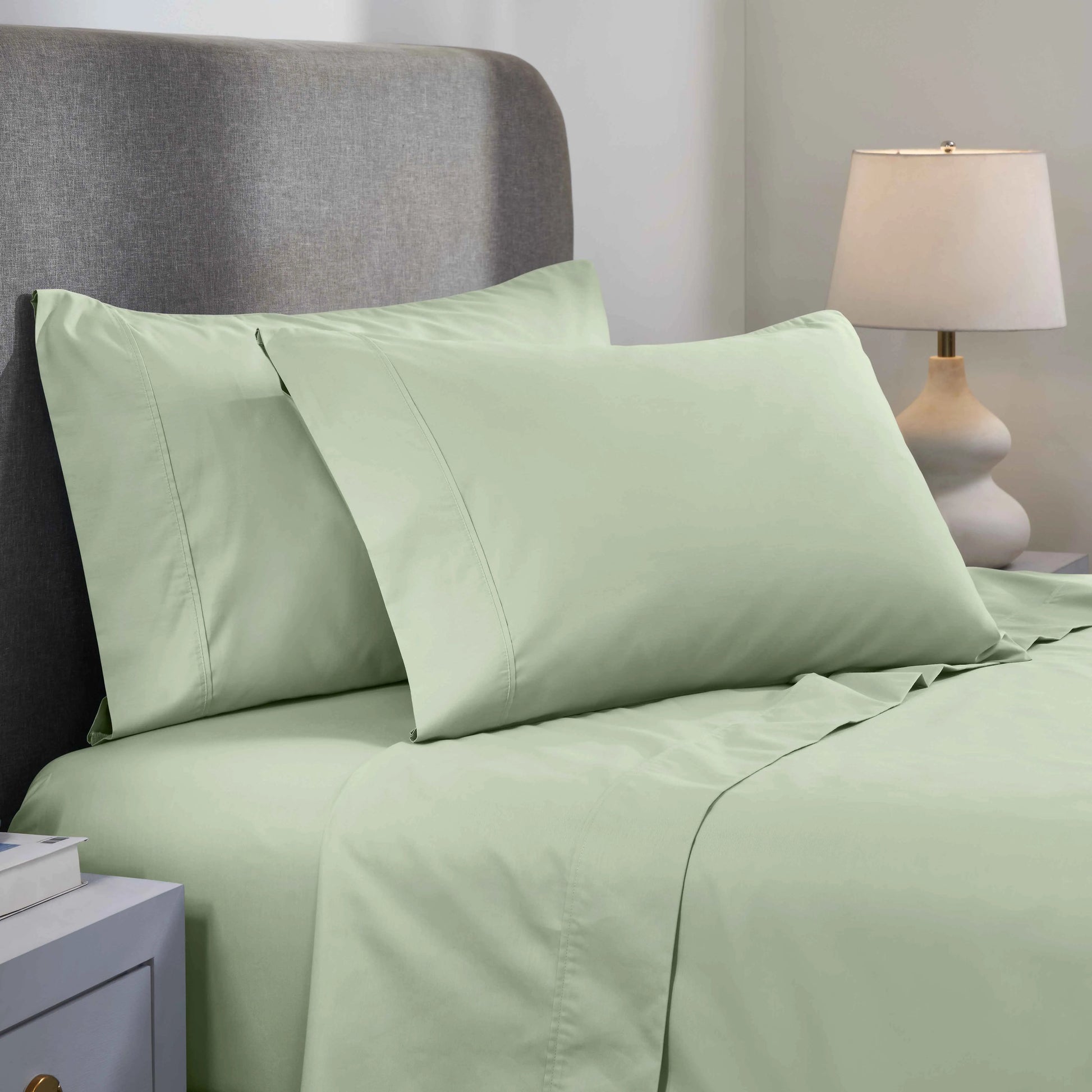 Light green 1000 Thread Count Cotton Blend Sheets Set solid deep pocket lifestyle display on a modern staged bed