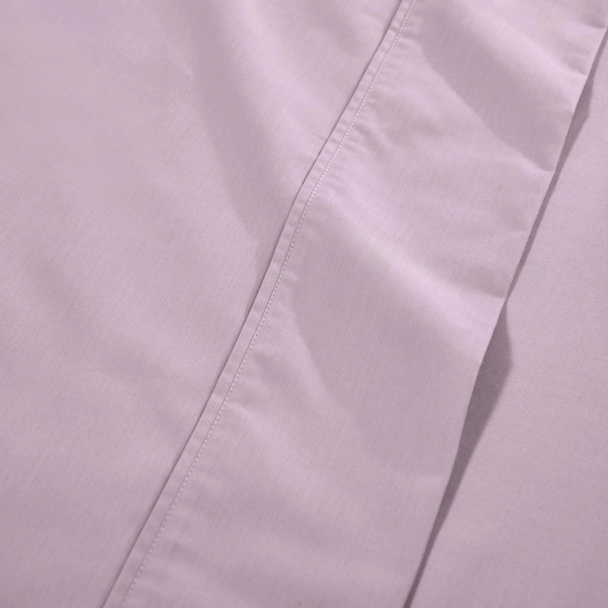 Lilac 1000 Thread Count Cotton Blend Sheets Set solid deep pocket hemline and stitching close-up fabric texture