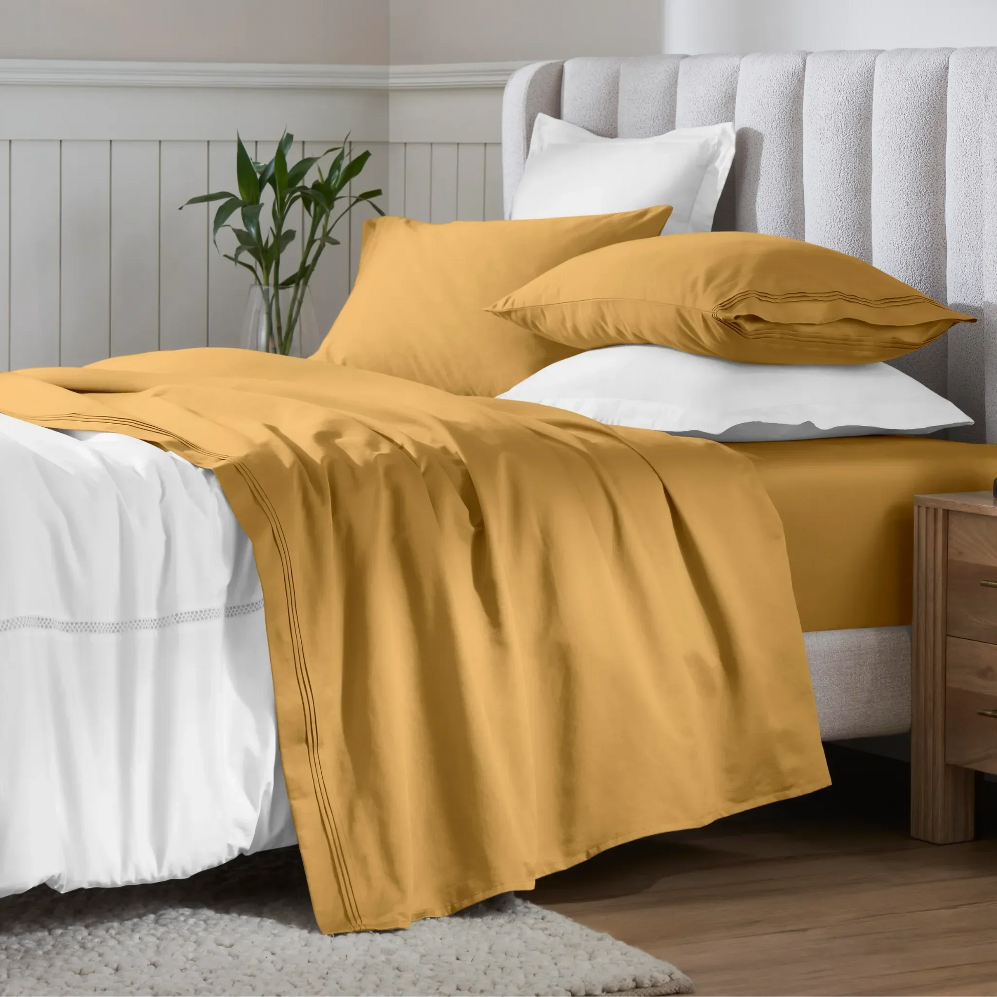 Maple Sugar Egyptian Cotton Sateen Sheet Set styled on a modern bed with white accents