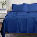Navy blue 300 Thread Count Modal Sheets Set made from beechwood displayed on a staged bed
