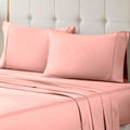 Pink 700 Thread Count Egyptian Cotton Sateen Bed Sheet Set displayed on a modern bed