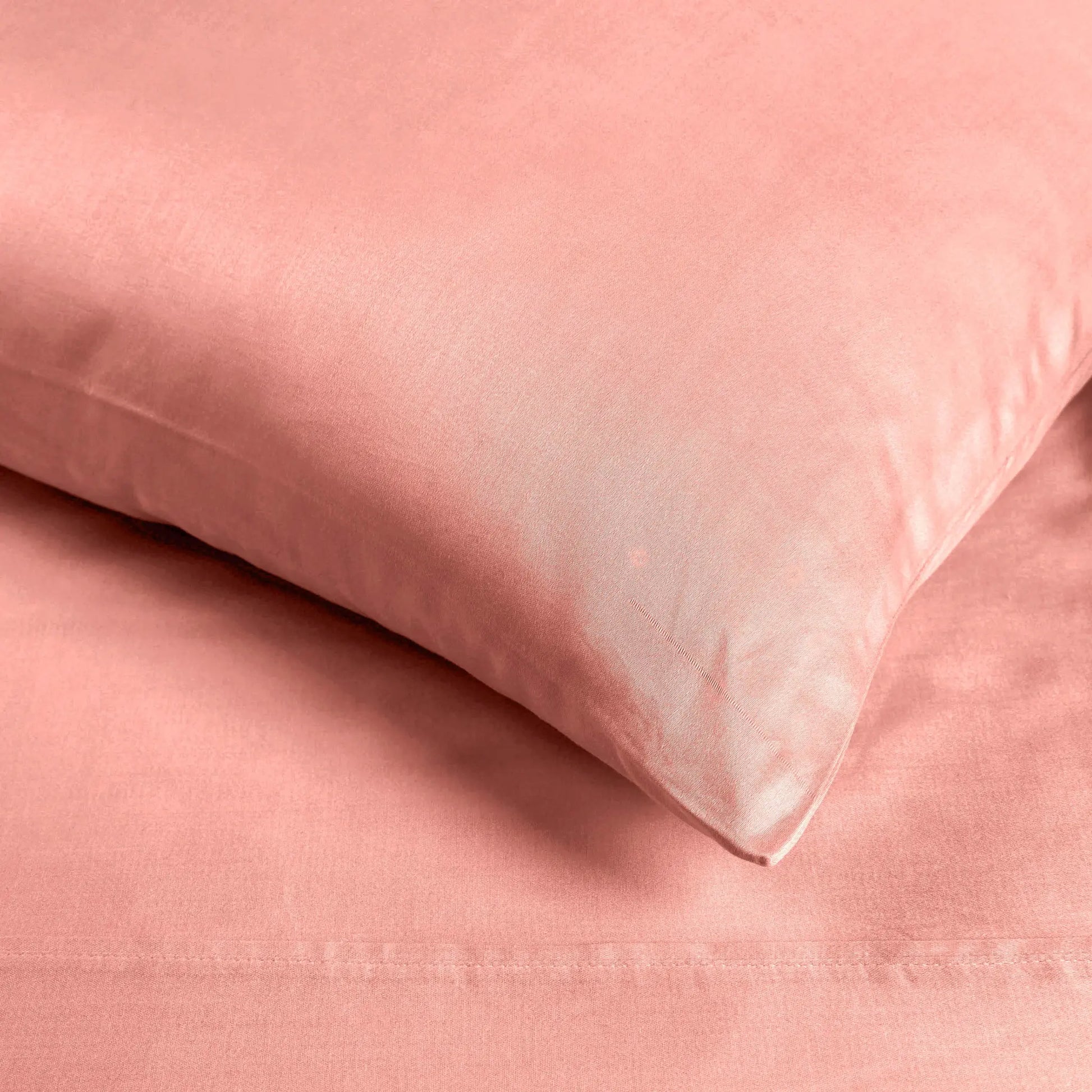 Pink 700 Thread Count Egyptian Cotton Sateen sheet fabric texture close-up