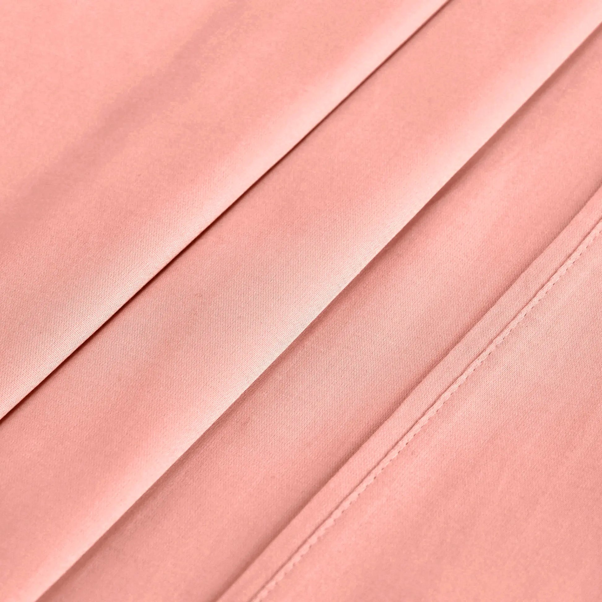 Pink 700 Thread Count Egyptian Cotton Sateen sheet hem and stitching detail close-up