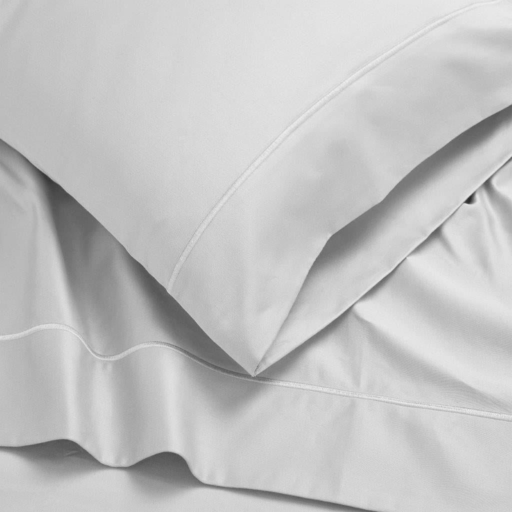 Platinum 1500 Thread Count Egyptian Cotton bedding set pillowcase border and fabric drape detail.