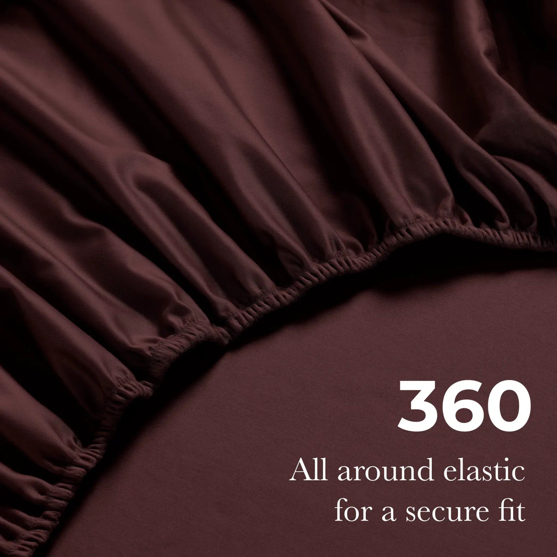 Plum red Egyptian Cotton fitted sheet showing 360-degree all-around elastic feature