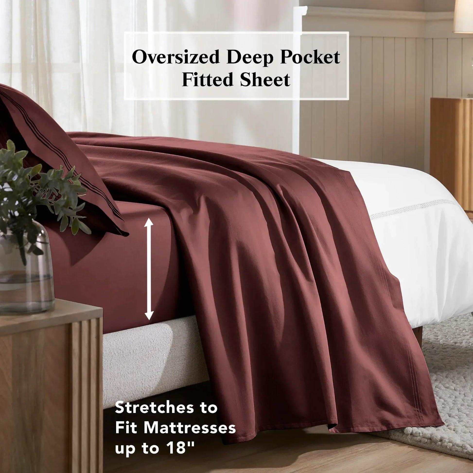 Plum red deep pocket fitted sheet showing an 18-inch mattress fit feature