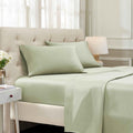 Sage Green 1500 Thread Count Egyptian Cotton Sheets Set deep pocket hotel quality lifestyle display on a modern staged bed.