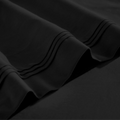Stitched embroidery detail on black Egyptian Cotton Sateen sheets